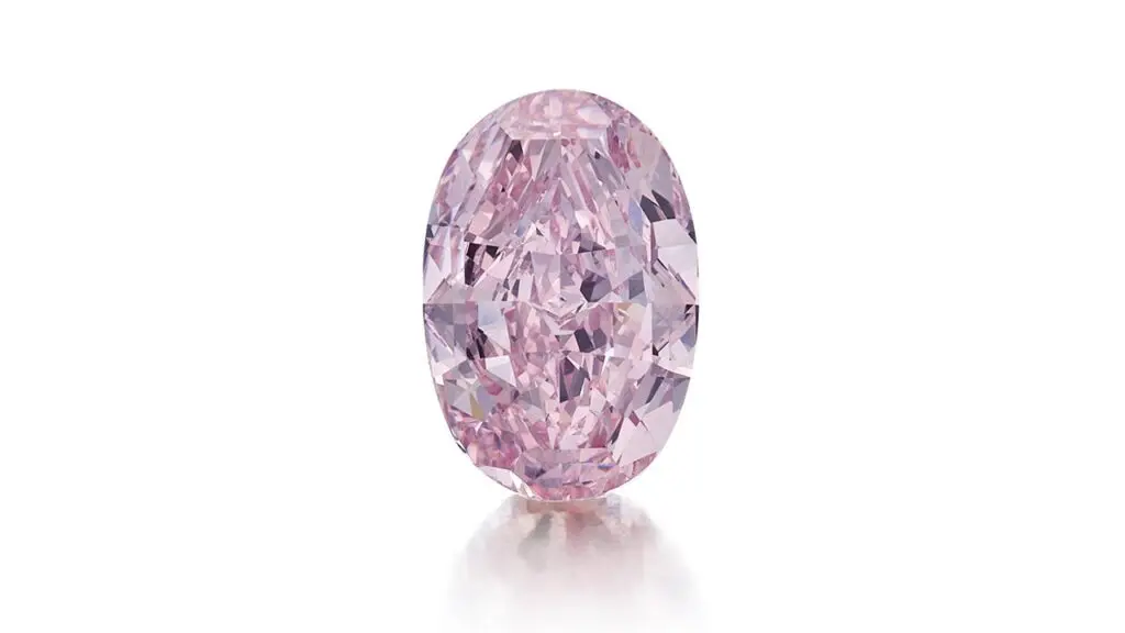 Ring bearing an oval-shaped, fancy-pink, diamond at Sotheby's image