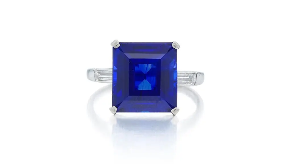Ring featuring a rectangular step-cut Kashmir sapphire, flanked by a pair of baguette diamonds at Sotheby's image