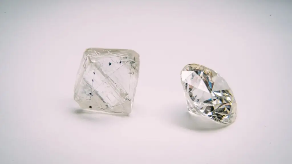 Rough and polished diamonds next to each other at De Beers’ Global Sightholder Sales offices in Gaborone, Botswana image