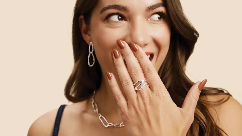 Model wearing silver jewelry from the Rocksbox Redefined collection image