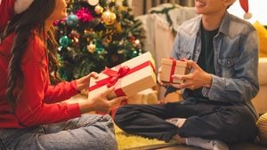 A couple exchanging holiday gifts image