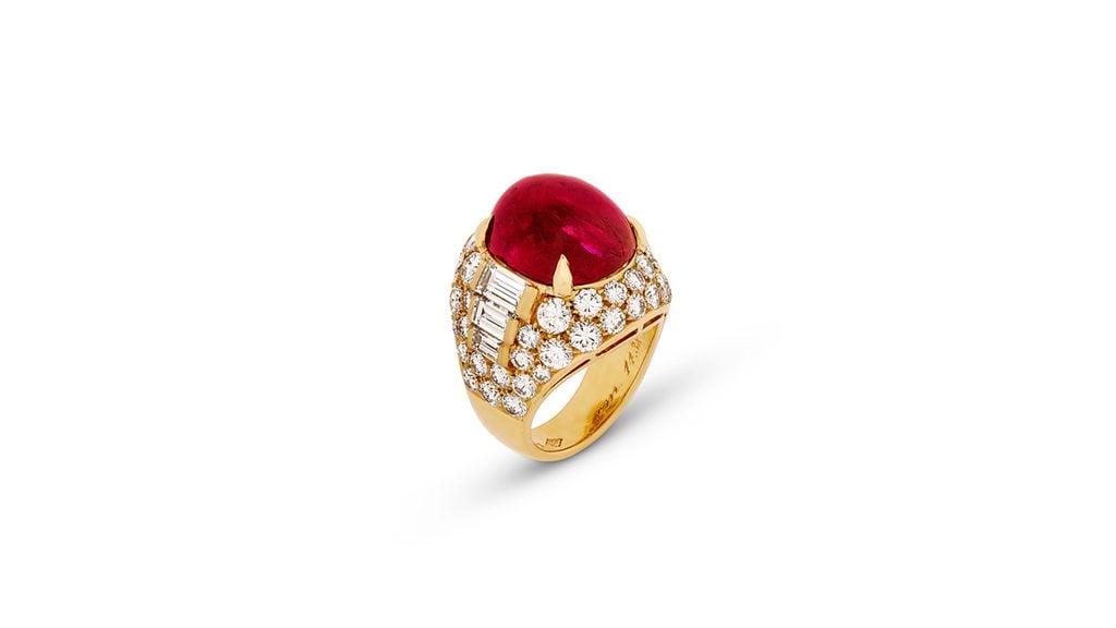 A Bulgari Trombino ring bearing a 14.38-carat Burmese cabochon ruby and baguette-cut and round diamonds at Christie's image