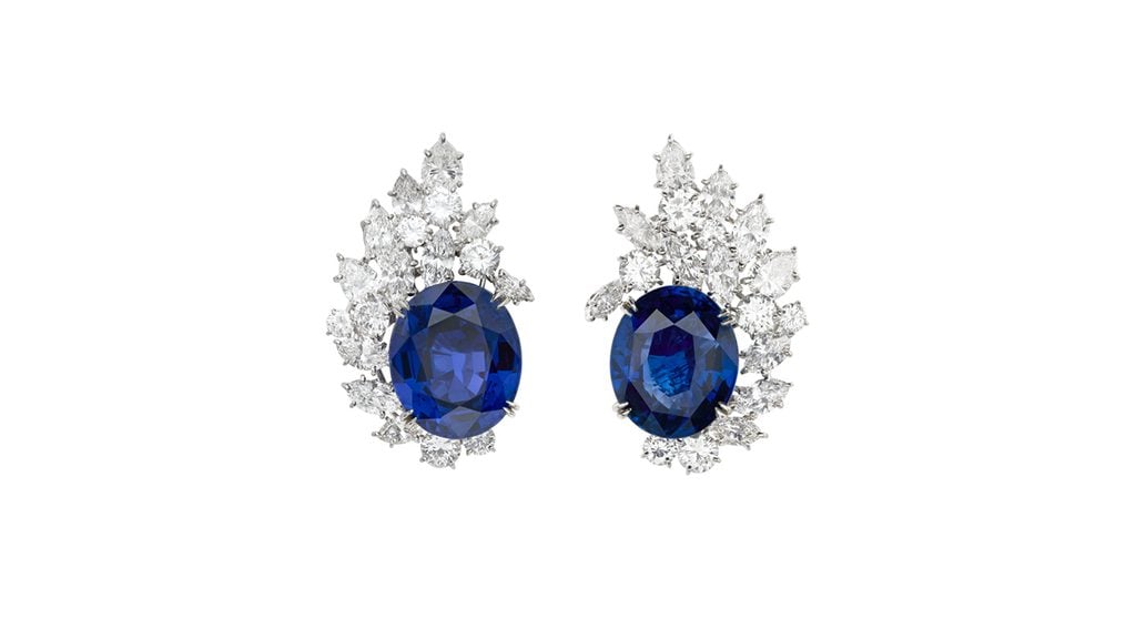 From Van Cleef & Arpels, these earrings have oval-shaped sapphires weighing 20.60 and 18.99 carats within a spray of marquise, pear-shaped and round diamonds at Christie's image