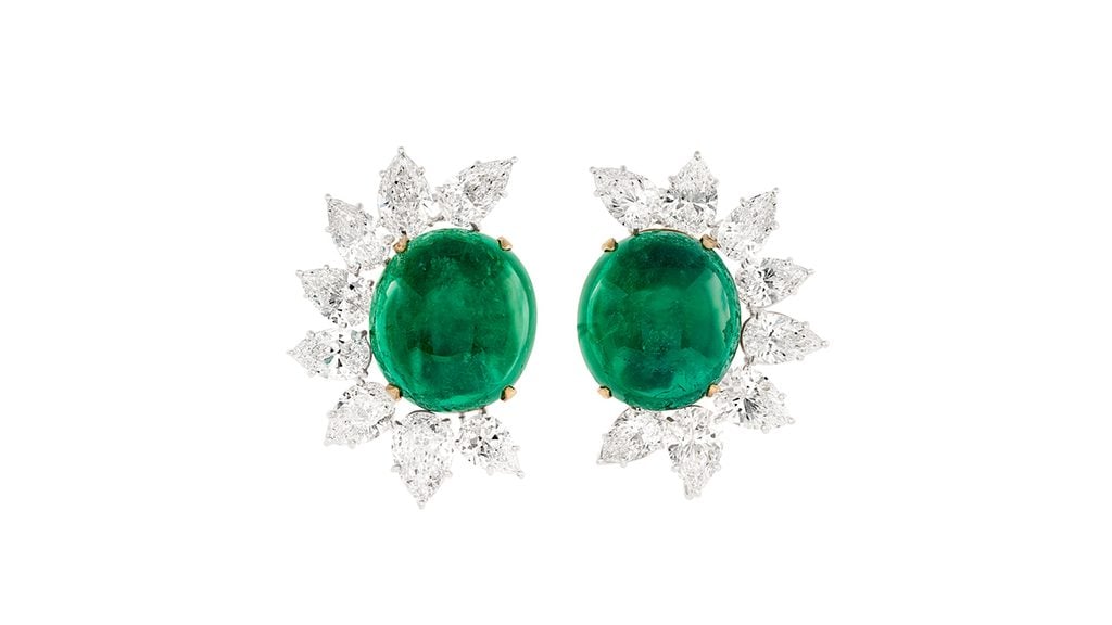 A pair of earrings from Graff featuring cabochon Colombian emeralds of 34.74 and 34.58 carats with pear-shaped diamonds at Christie's image