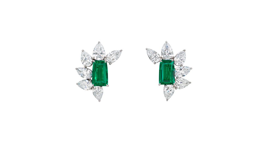 A pair of earrings with rectangular step-cut Colombian emeralds weighing 3.58 and 3.48 carats and pear-shaped diamond accents at Christie's image