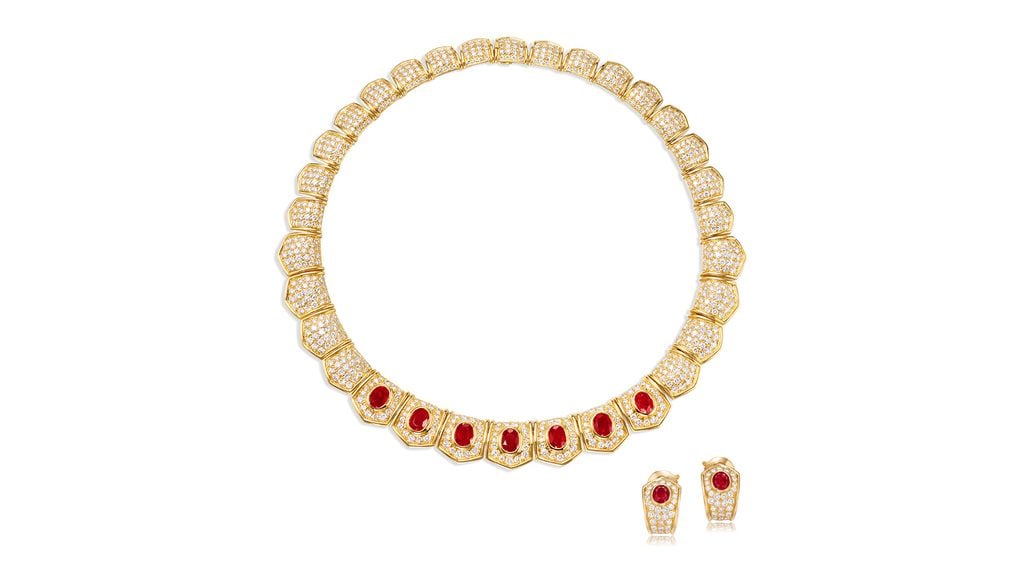 A Van Cleef & Arpels necklace and earrings set containing oval-cut rubies and circular-cut diamonds at Poly Auction image