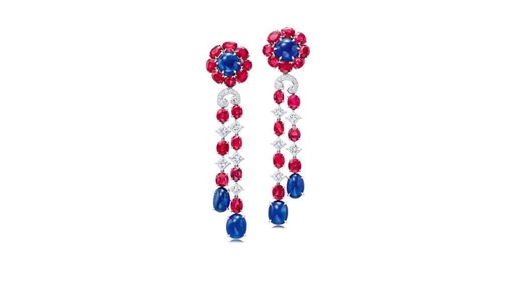 This pair of earrings features 31.80 carats of oval-cut Burmese rubies and 31.33 carats of Burmese cabochon sapphires, embellished with rectangular and circular-cut diamonds at Poly Auction image