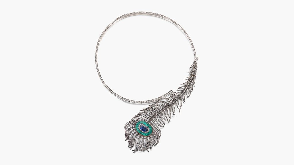From Boucheron, this necklace, designed as a peacock feather, has a heart-shaped sapphire, a calibré-cut emerald and old mine- and rose-cut diamonds. The piece can also be converted into a brooch and hairpin at Sotheby's image