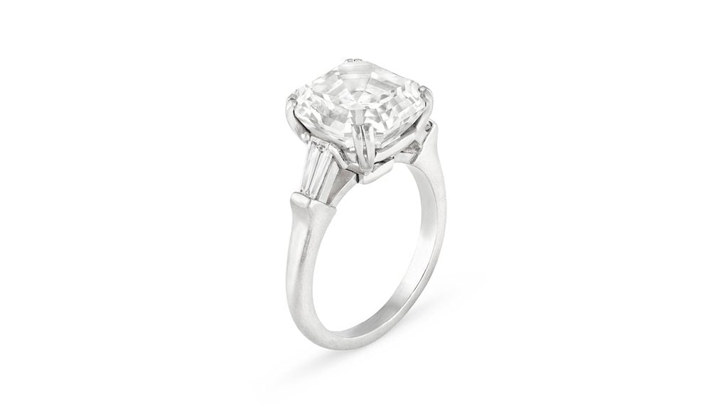 A Graff ring starring a square emerald-cut, 7.85-carat, D, VS1-clarity, type IIa diamond with the potential to be internally flawless, between tapered baguette-cut diamonds at Christie's image