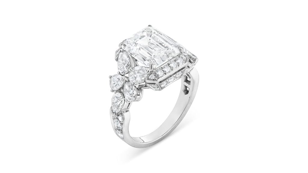 A Van Cleef & Arpels ring sporting an emerald-cut, 5.22-carat, D, VVS2 diamond, embellished with approximately 2.60 carats of pear and round diamonds at Christie's image