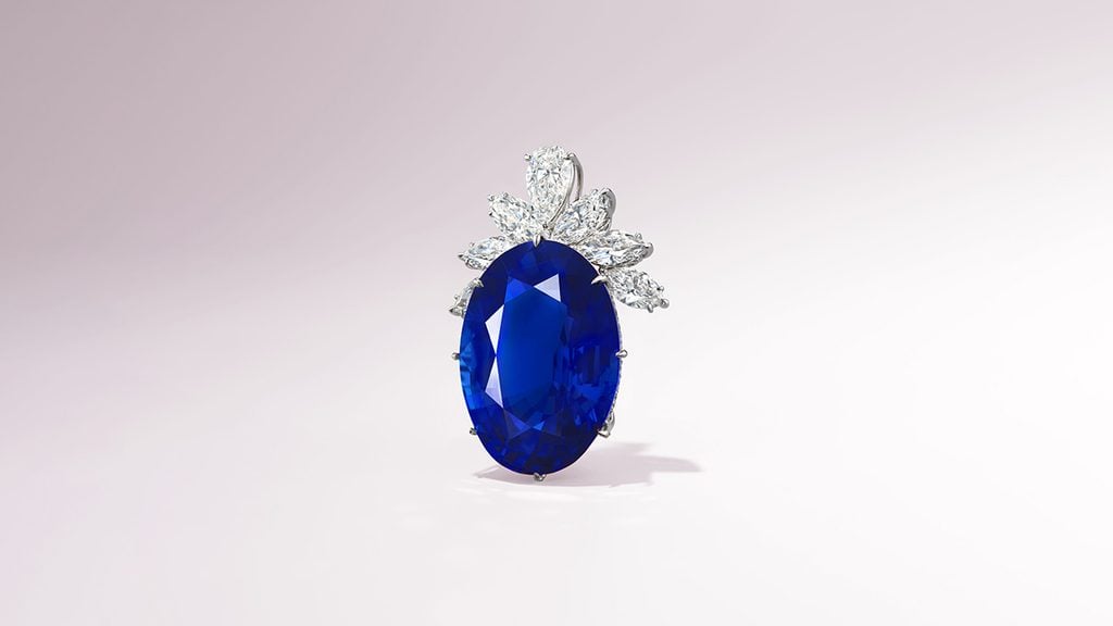 This pendant comprises a 100.16-carat Burmese royal blue sapphire with diamond accent stones at Christie's image