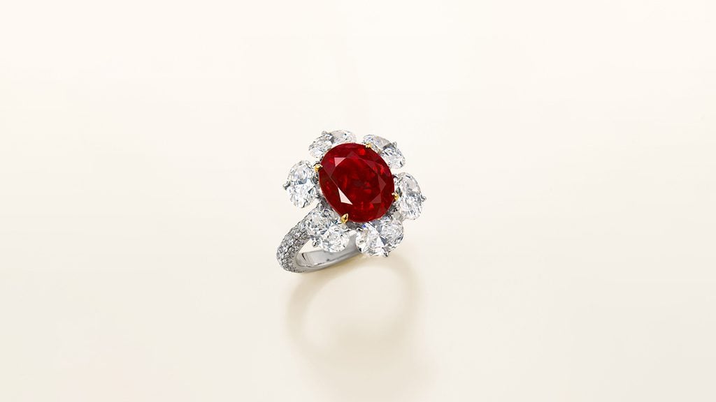 A ring with a 5.03-carat, pigeon’s blood Burmese ruby in a diamond surround at Christie's image