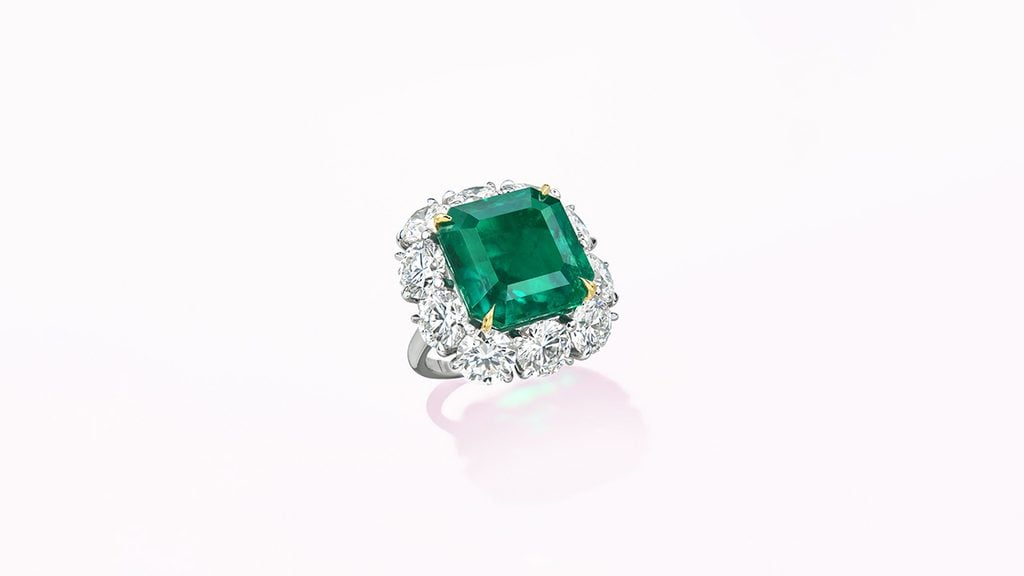 A ring with an 18.20-carat Colombian emerald surrounded by diamonds at Christie's image